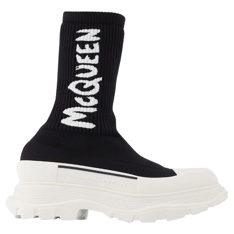 Luxury Classic Tread Slick Sneakers in Black and White Fabric