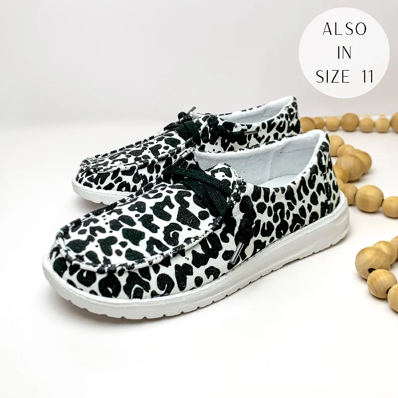 Elegant Design Very G | Have To Run Cow Print Slip On Loafers with Laces in Black